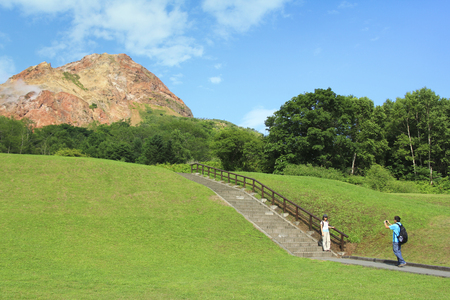 HOKKAIDO, JAPAN - AUGUST 28, 2015 : View of Usu-zan mountain (Mount Usu), an active volcano near Toya lake, the famous tourist attraction of Hokkaido.のeditorial素材