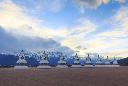 Scenery of  Meili snow mountain and row of Tibetan stupas, this is viewpoint from Feilai temple at Deqing, Yunnan, China.の写真素材