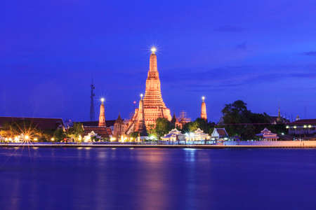 Wat Arun Temple in twilight time, located near Chao Phraya River, famous tourist attraction of Bangkok, Thailandの写真素材