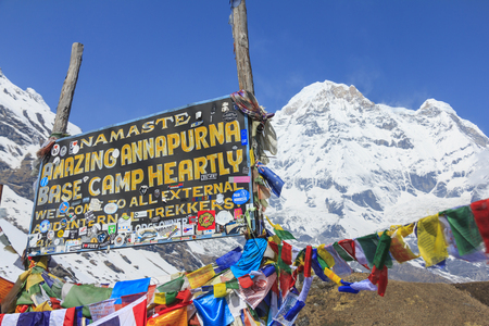Himalaya Annapurna South mountain peak with Annapurna base camp sign, there is very famous trekking destination in Nepal.のeditorial素材