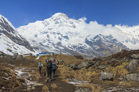 Tourists trekking to Himalaya Annapurna base camp, famous trekking destination in Nepal.のeditorial素材
