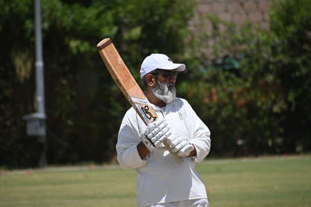 Cricket batsman playing a shot