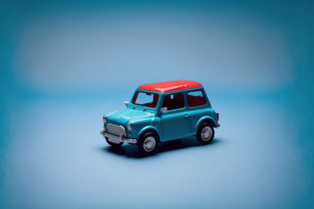 Miniature toy car on a blue background. 3d rendering.の写真素材