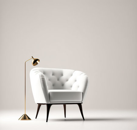 Luxury white armchair with golden lamp on grey wall backgroundの素材