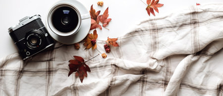 Coffee cup, vintage camera, autumn leaves and plaid on white background. generative aiの素材