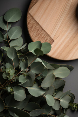 Eucalyptus branches and eucalyptus leaves on wooden cutting board. generative aiの素材