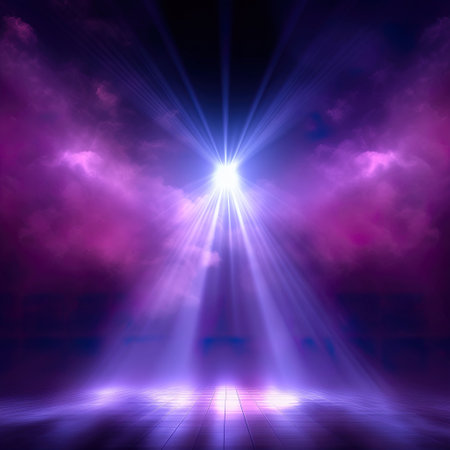 abstract scene with rays of light and smoke on a dark backgroundの素材