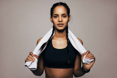 Close up portrait of a mixed race woman in sportswearの写真素材