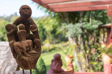 Thai garden, with plants and small sculpture viewの写真素材