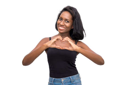 Woman making heart shape handsの写真素材