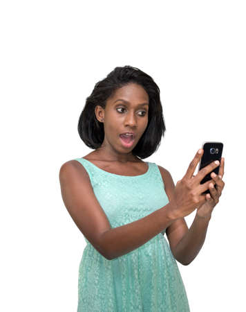 Surprised woman using cellphoneの写真素材