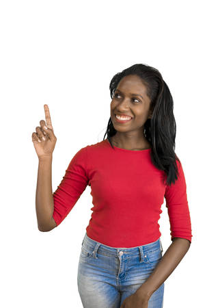 Woman pointing and looking upの写真素材