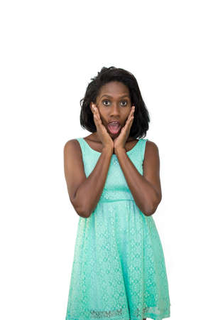 Shocked woman holding her faceの写真素材