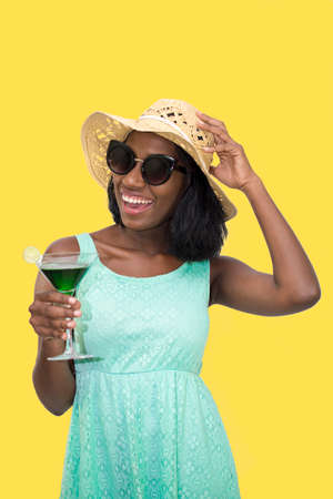 Happy tourist with cocktail drinkの写真素材