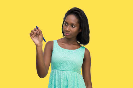 Woman writing with penの写真素材