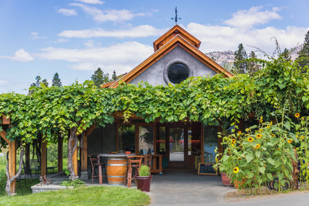 OKANAGAN FALLS, BRITISH COLUMBIA, CANADA - AUG. 2016: Matheson Creek Farm in the Okanagan Valley. This beautiful fruit stand was constructed using straw bales and reclaimed wood.のeditorial素材