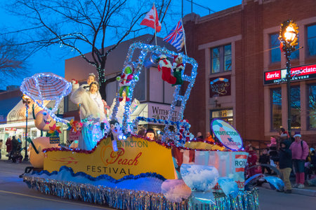 Penticton, British Columbia/Canada - December 3, 2016: Miss Penticton waves to the crowds from the...