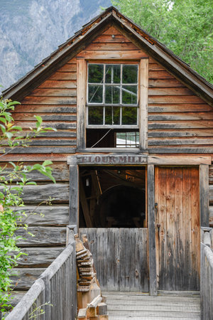 Keremeos, British Columbia/Canada - June 3, 2017: the old flour mill building at The Grist Mill and Gardens Keremeos, an important historic site dating to 1877.のeditorial素材