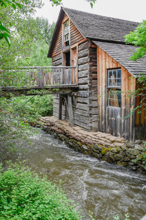 Keremeos, British Columbia/Canada - June 3, 2017: flour mill and Keremeos Creek at The Grist Mill and Gardens Keremeos, an important historic site dating to 1877.のeditorial素材