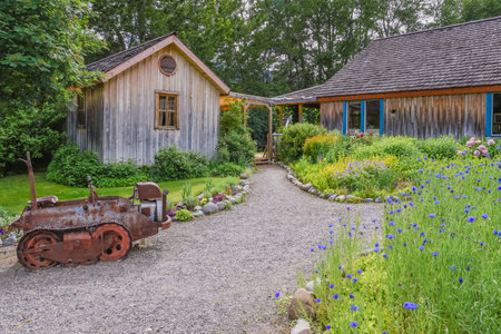Keremeos, British Columbia/Canada - June 3, 2017: garden pathways at the entrance to The Grist Mill and Gardens Keremeos, an important heritage site dating to 1877.のeditorial素材