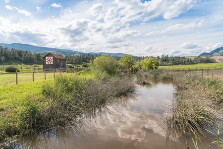 Vernon, British Columbia/Canada - June 2, 2018: Deep Creek and the Shubert Barn at O'Keefe Ranch, an important historic site in the Okanagan Valleyのeditorial素材