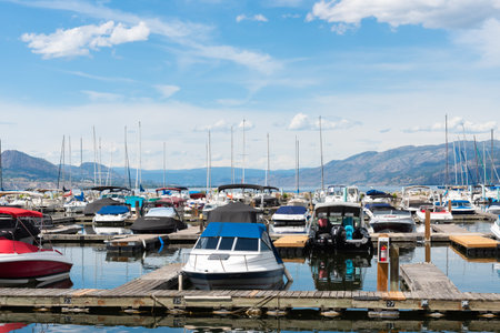 Penticton, British Columbia/Canada - June 13, 2019: close-up of boats docked at the Penticton Marina and Yacht Club on Okanagan Lake, the largest marina in the South Okanagan.のeditorial素材
