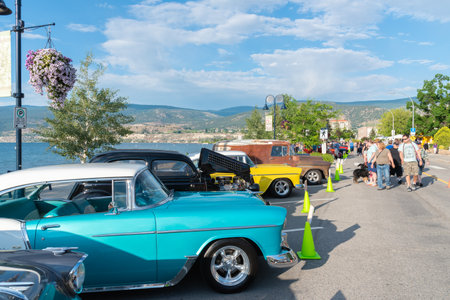 Penticton, British Columbia/Canada - June 21, 2019: people look at the cars on display for the Peach City Beach Cruise, one of the largest car shows in North America.のeditorial素材