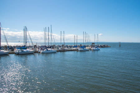 White Rock, British Columbia/Canada - September 8, 2016: boats docked by the historic White Rock walking pier, a popular tourist attractionのeditorial素材