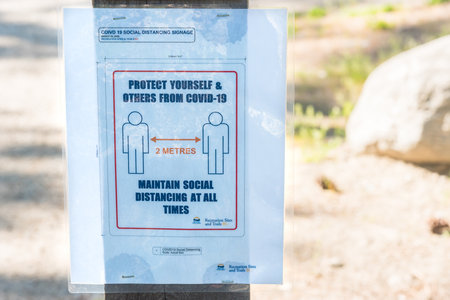 May 5, 2020 - Naramata, BC, Canada: sign posted  on the Kettle Valley Rail Trail during the...
