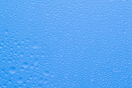 blue background of water drops.