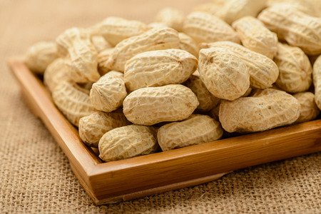 peanuts in the wooden plate