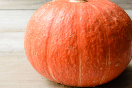 orange pumpkins on the wooden boardの写真素材