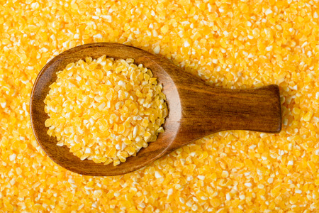 polenta in the wooden spoonの写真素材