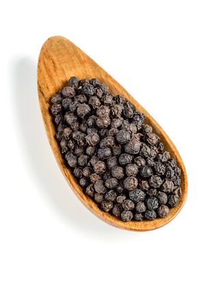black pepper in the wooden bowl, (large depth of field, taken with tilt shift lens)の写真素材