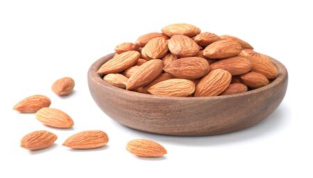 dried almons in wooden bowlの写真素材