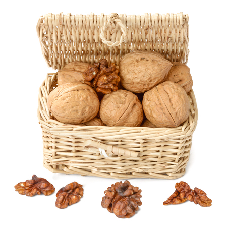 walnuts in the basket, isolatedの写真素材