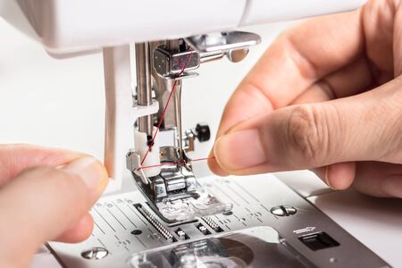 thread the needle for the sewing machineの写真素材