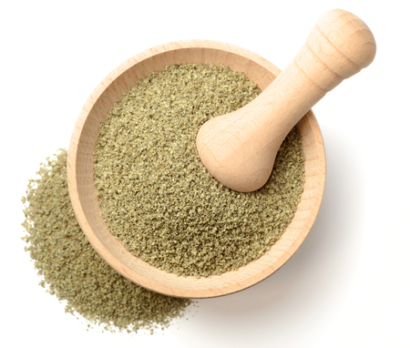 dried salvia in the wooden mortar, isolated on white, top viewの写真素材