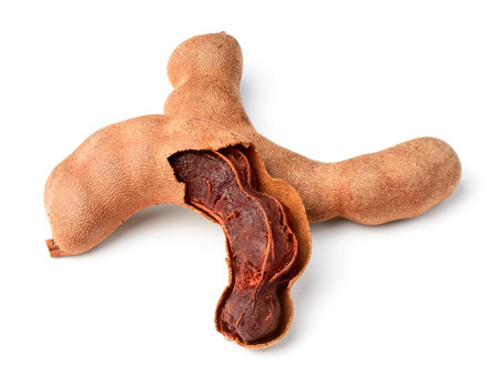 fresh tamarind fruit isolated on whiteの写真素材