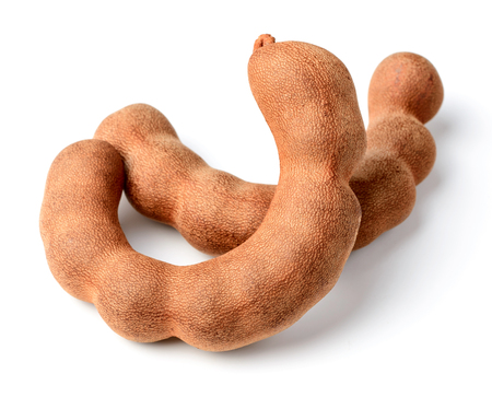 fresh tamarind fruit isolated on whiteの写真素材