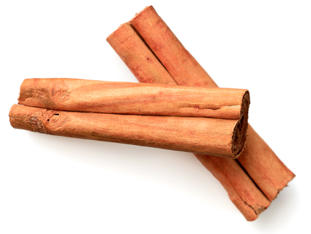 cinnamon sticks isolated on white background, top viewの写真素材