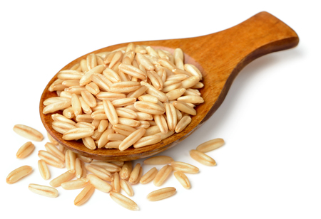 raw oats isolated on the white backgroundの写真素材