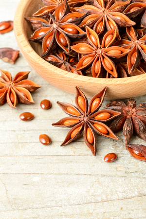 star anise fruits on the wooden boardの写真素材