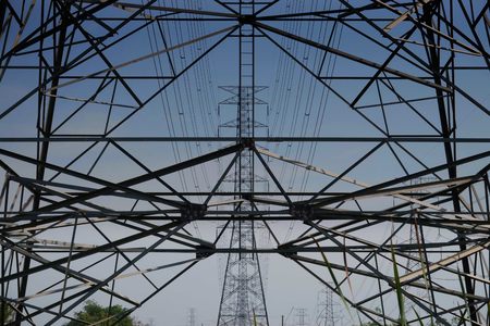 High voltage towers with sky background.の写真素材