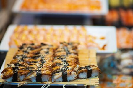 sushi for sell in the supermarket, Sushi is Japanese national food popular throughout the worldの写真素材