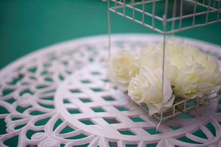Beautifully White rose on white table. Wedding Decorationsの写真素材