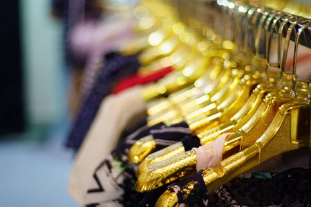 blurred abstract Fashion Cloth Hangers background close upの写真素材