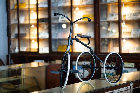 Small Old rusty kid bicycle retro style vintageの写真素材