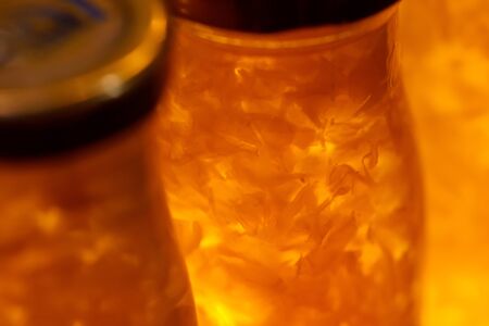 Close up Fresh natural Fruit meat with juice in glass bottleの写真素材