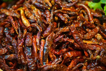 close up Roasting dried chilli at thailand street food marketの写真素材